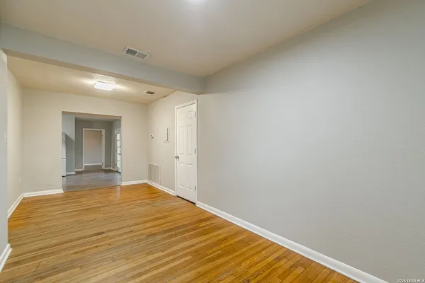 a view of an empty room and window