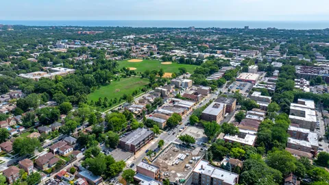 an aerial view of a city with lots of residential buildings
