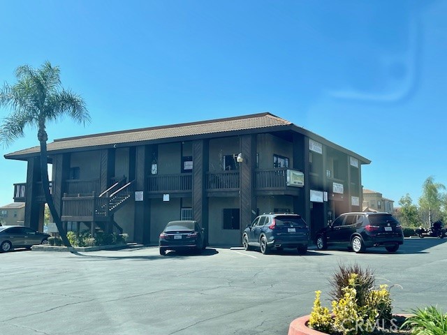 2176 West Foothill Boulevard, Unit B Upland, CA 91786 - Photo 1 of 7 a view of a house with a yard