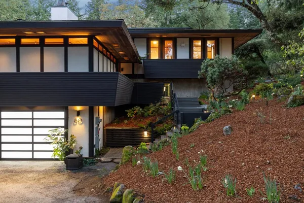 a backyard of a house with seating space