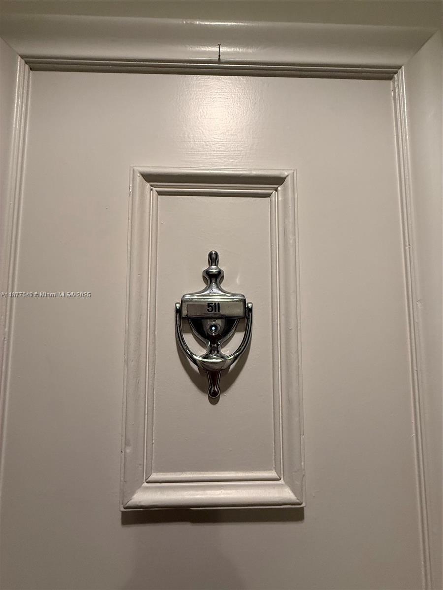 5161 Collins Avenue, Unit 511 Miami Beach, FL 33140 - Photo 19 of 29 a bathroom with a sink and mirror