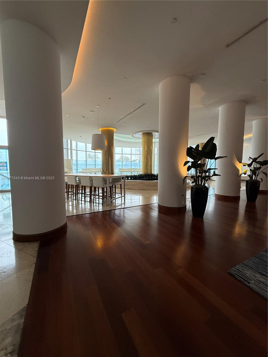 5161 Collins Avenue, Unit 511 Miami Beach, FL 33140 - Photo 21 of 29 a view of a living room and dining room