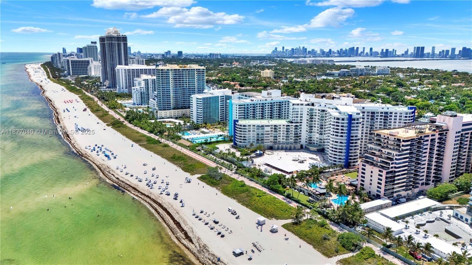 5161 Collins Avenue, Unit 511 Miami Beach, FL 33140 - Photo 28 of 29 a city view with tall buildings