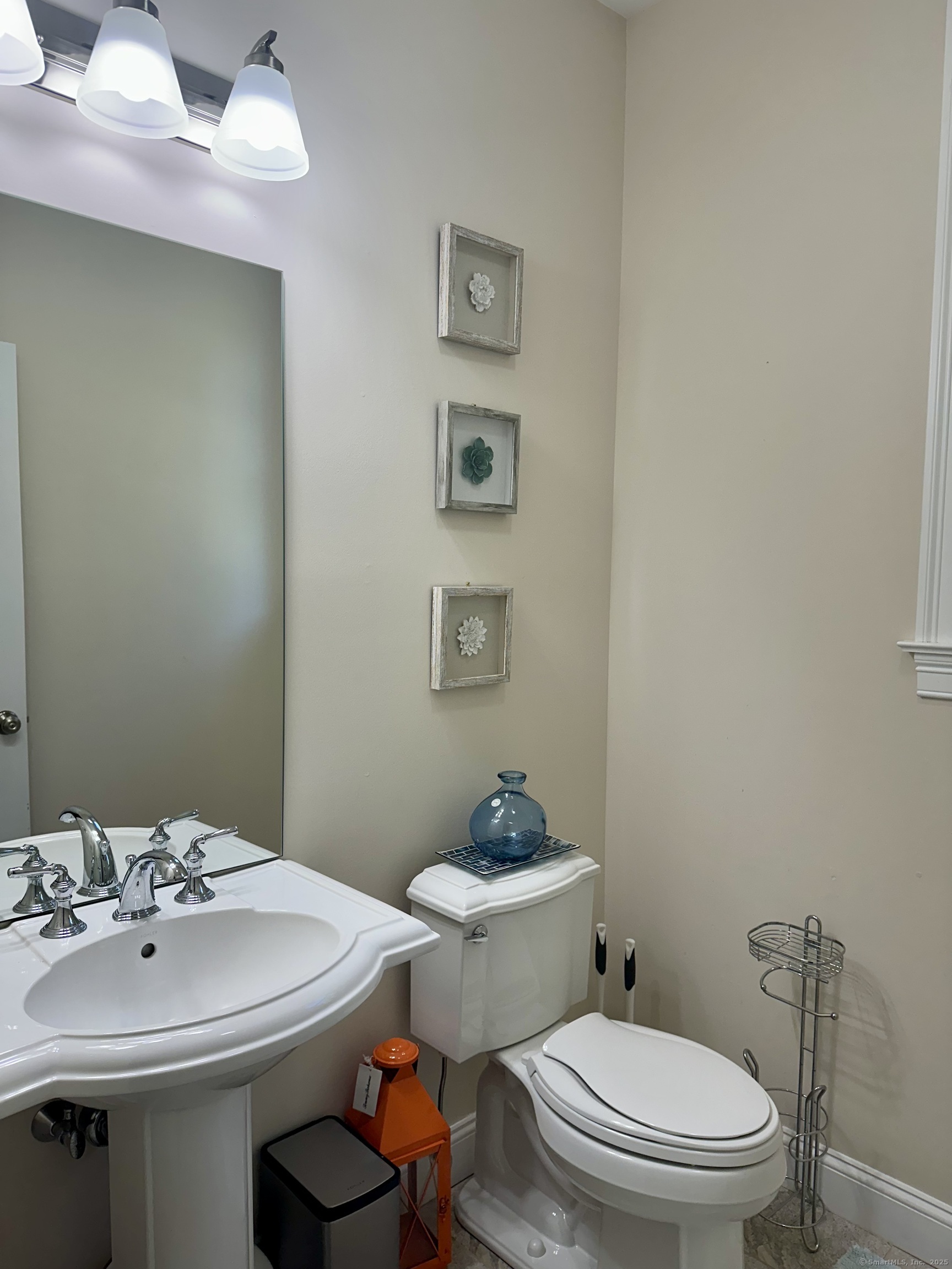 102 Pheasant Lane Granby, CT 06060 - Photo 11 of 33 a bathroom with a sink a toilet and mirror
