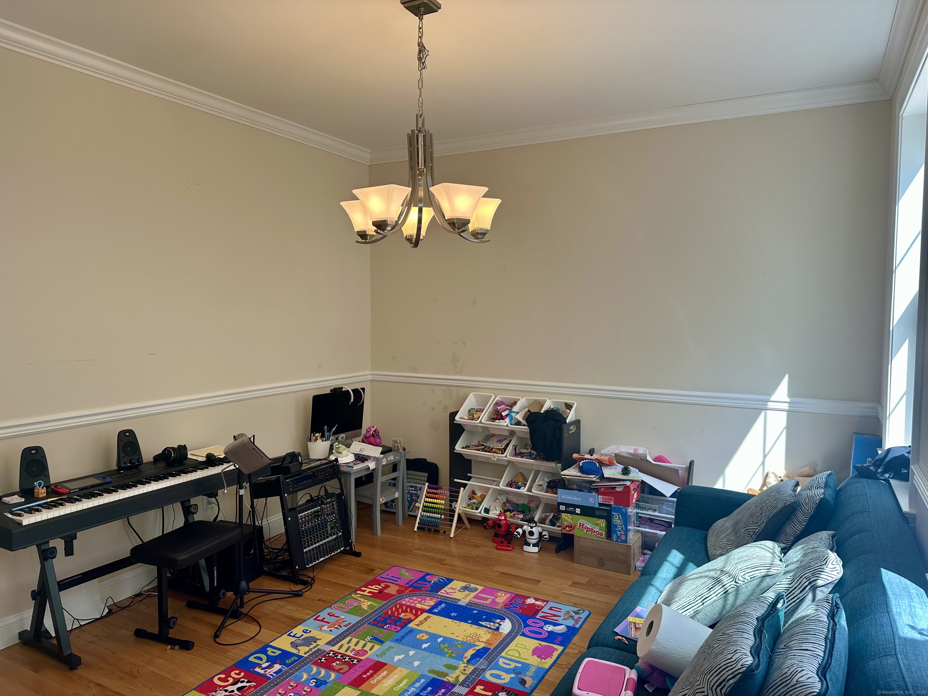 102 Pheasant Lane Granby, CT 06060 - Photo 13 of 33 a living room with lots of furniture and a wooden floor