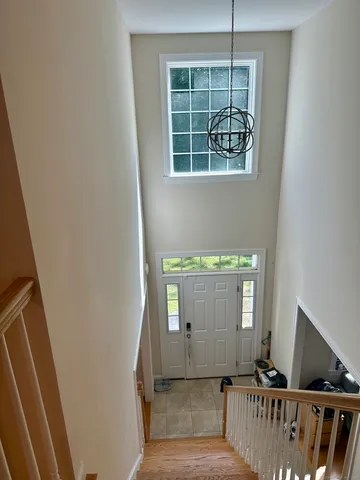 a view of a porch with wooden floor
