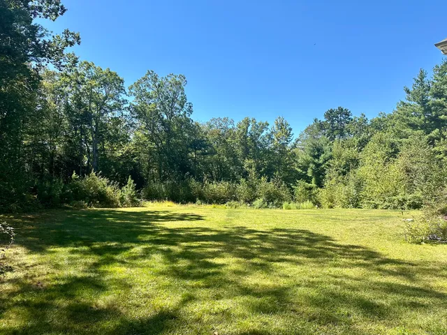a view of a ocean with a big yard