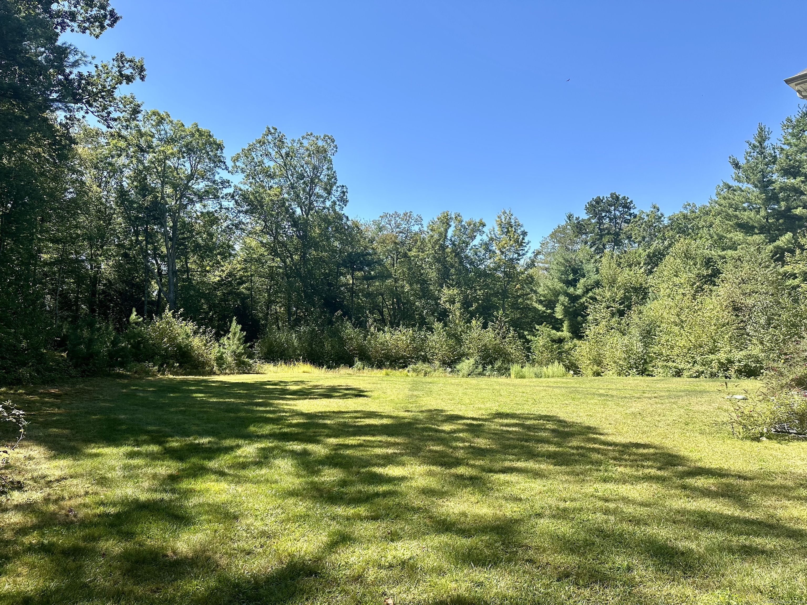102 Pheasant Lane Granby, CT 06060 - Photo 33 of 33 a view of a ocean with a big yard