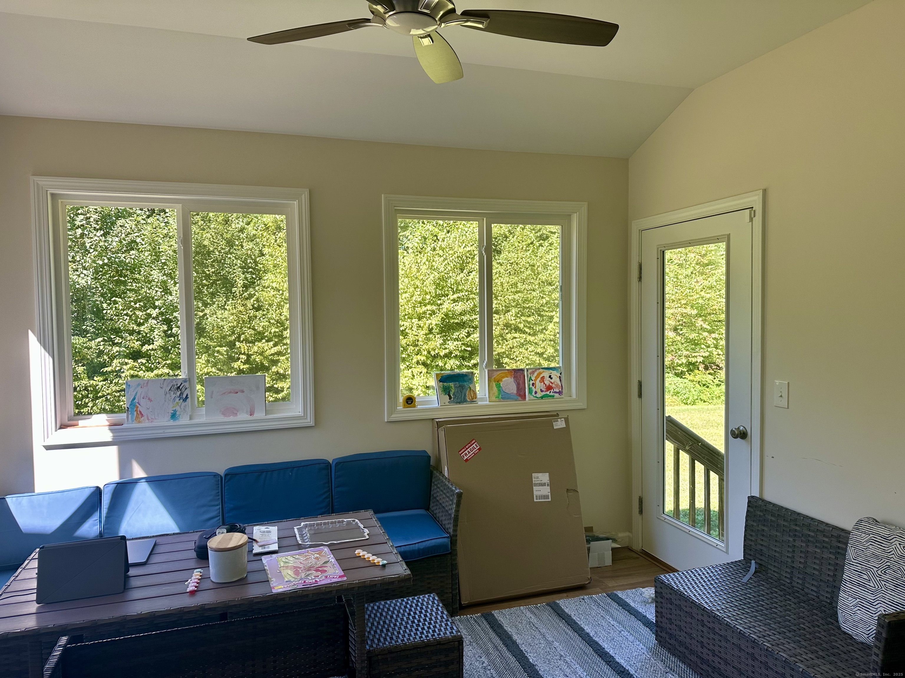 102 Pheasant Lane Granby, CT 06060 - Photo 9 of 33 a living room with furniture and a window