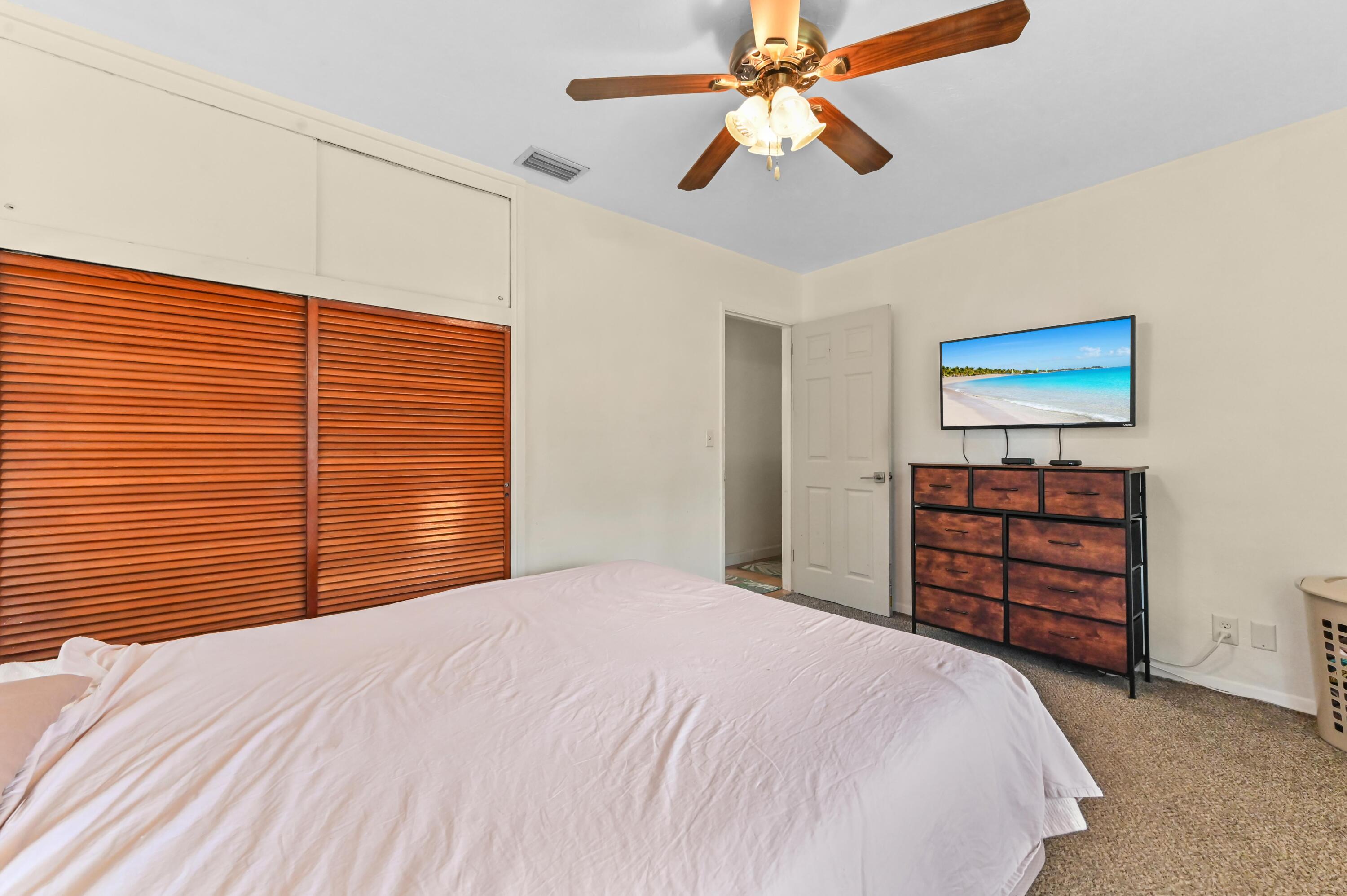 5709 Southeast Indigo Avenue Stuart, FL 34997 - Photo 12 of 24 15 Bedroom 02