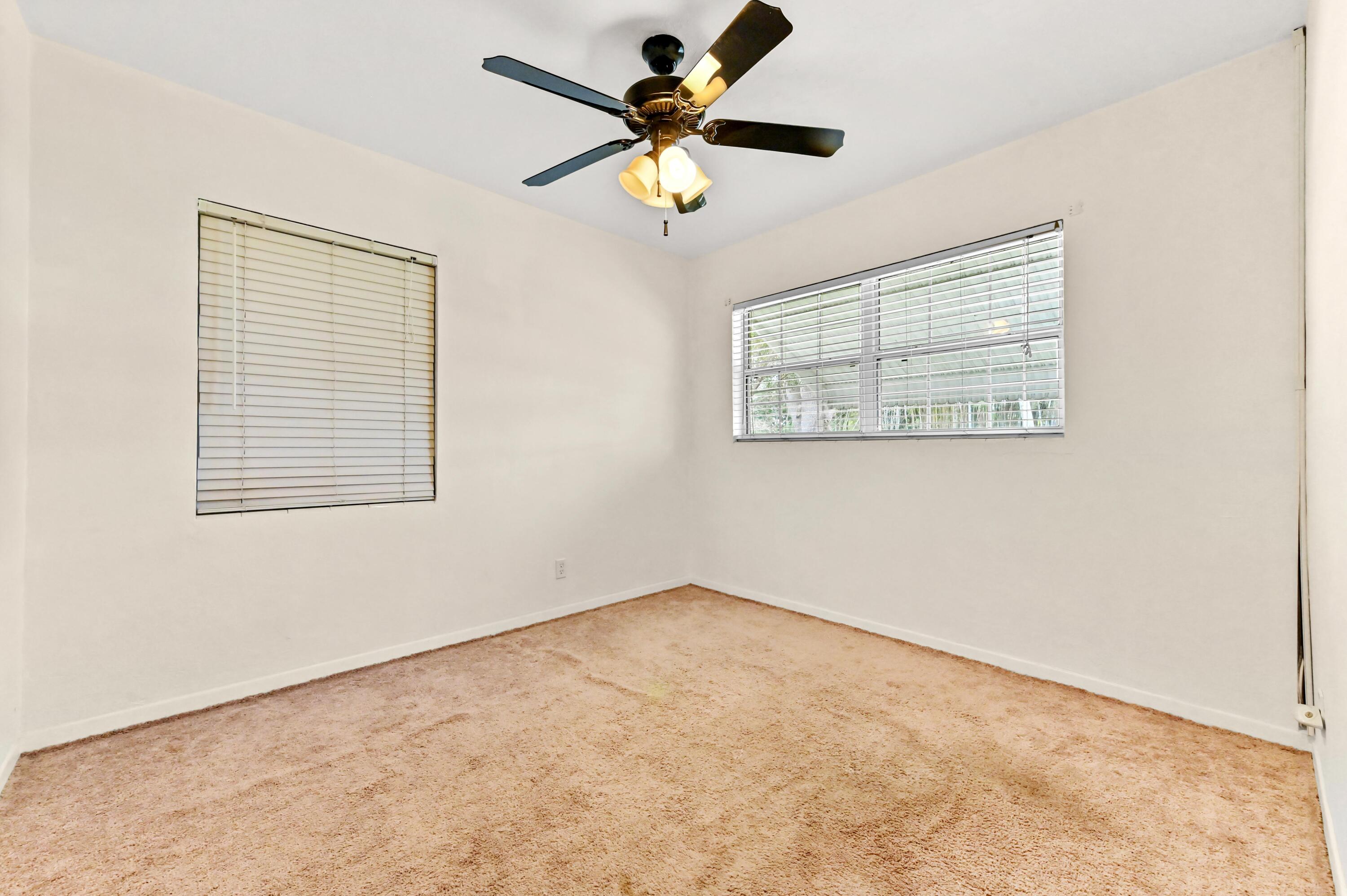 5709 Southeast Indigo Avenue Stuart, FL 34997 - Photo 13 of 24 16 Bedroom 01