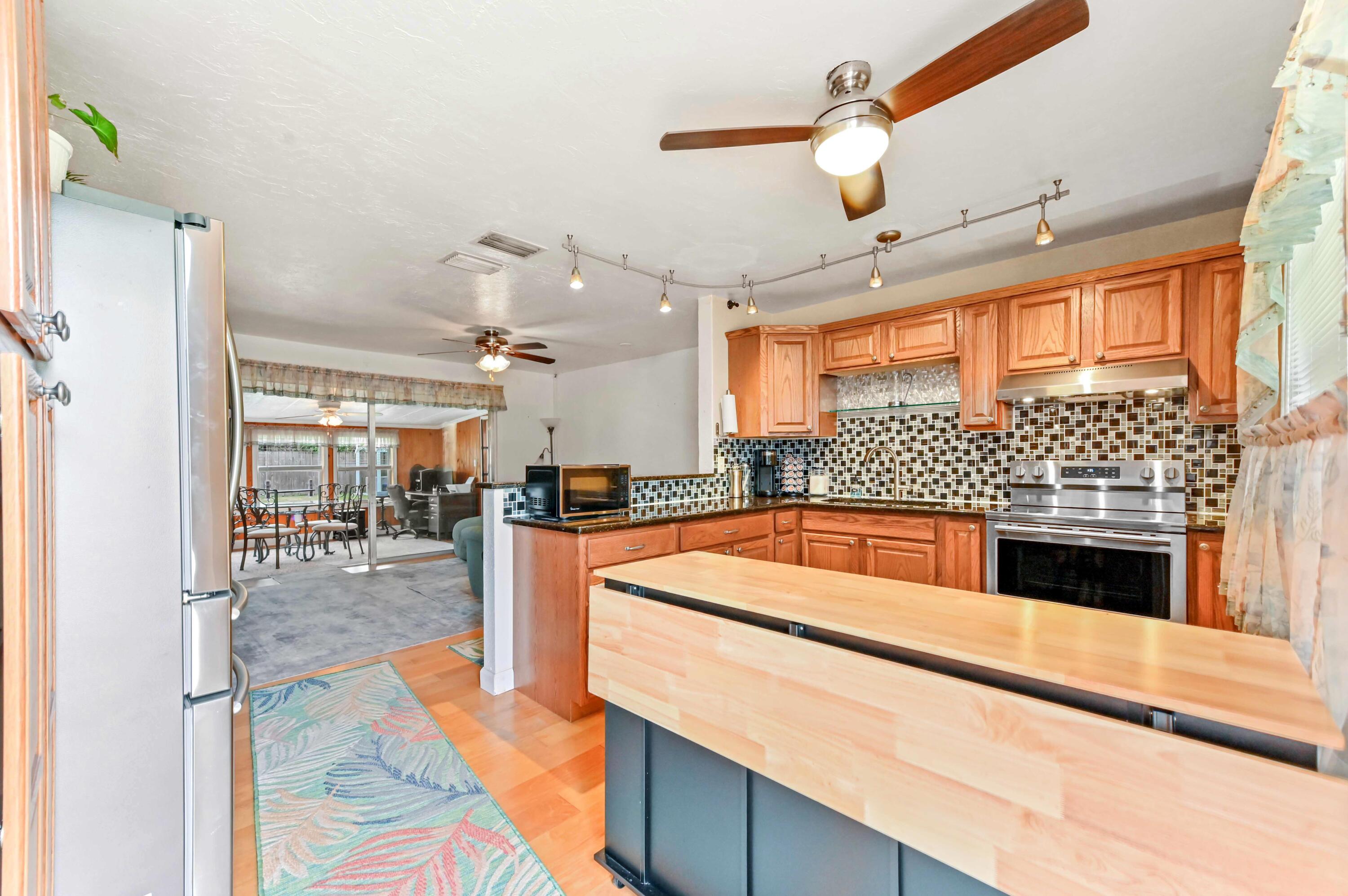 5709 Southeast Indigo Avenue Stuart, FL 34997 - Photo 2 of 24 04 Kitchen 01