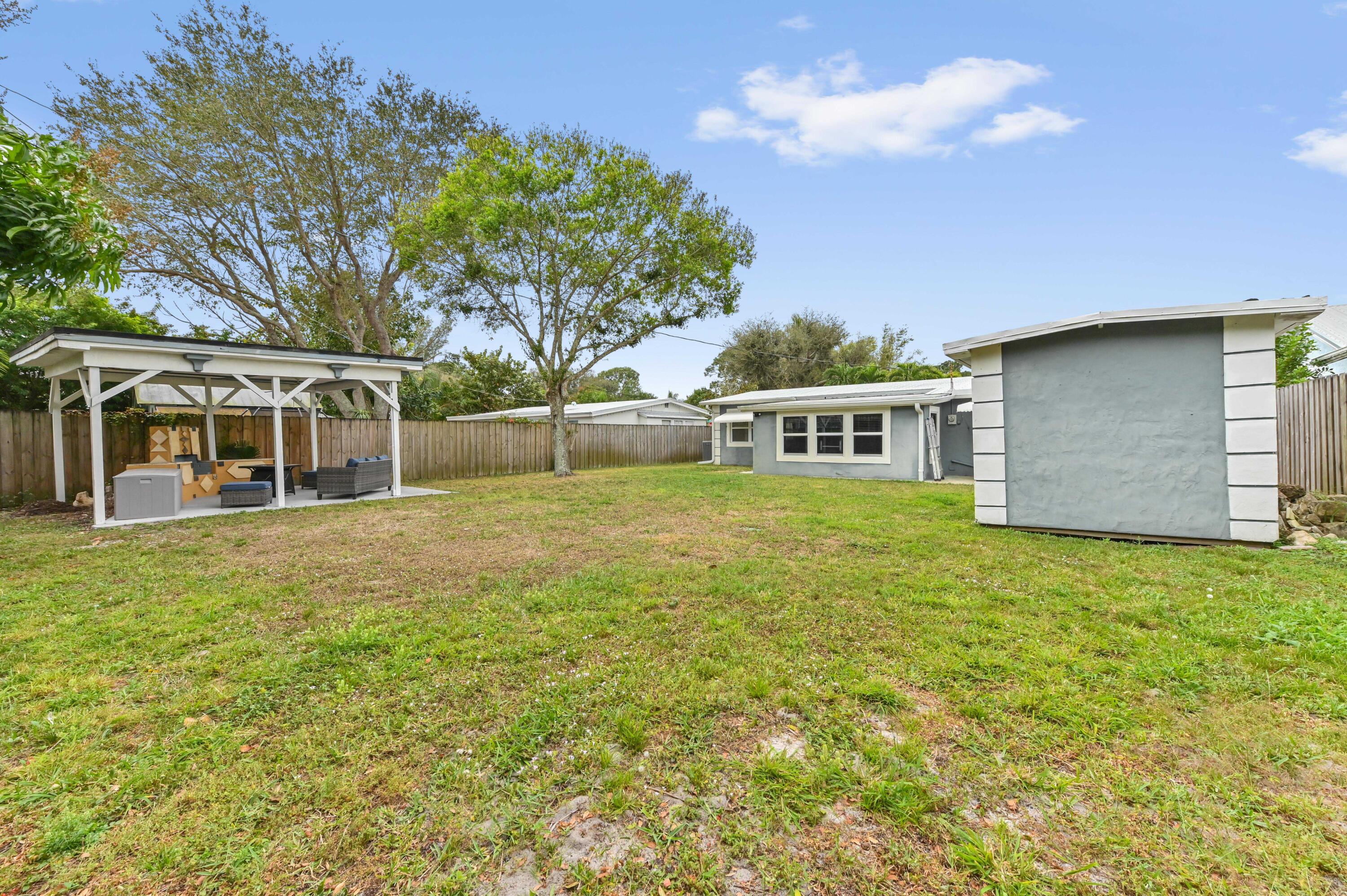 5709 Southeast Indigo Avenue Stuart, FL 34997 - Photo 22 of 24 24 Rear 03