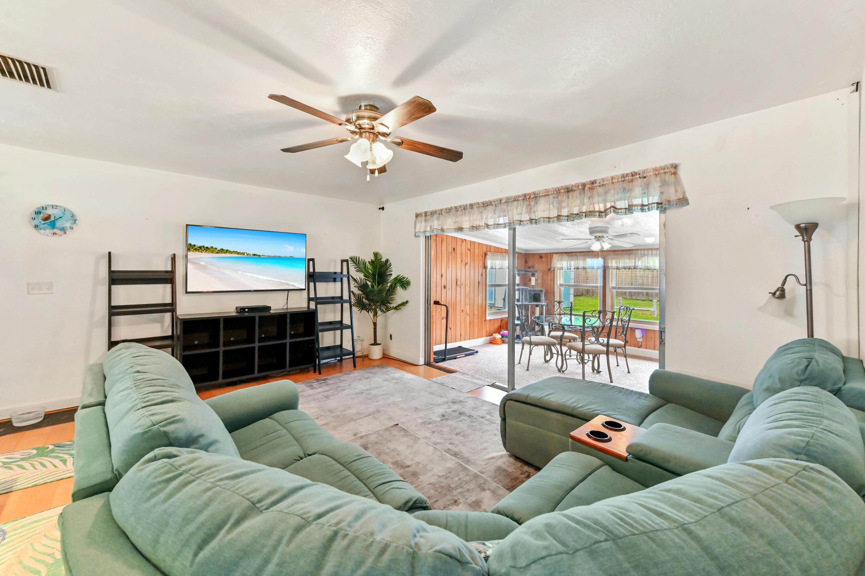 5709 Southeast Indigo Avenue Stuart, FL 34997 - Photo 5 of 24 08 Living room 02