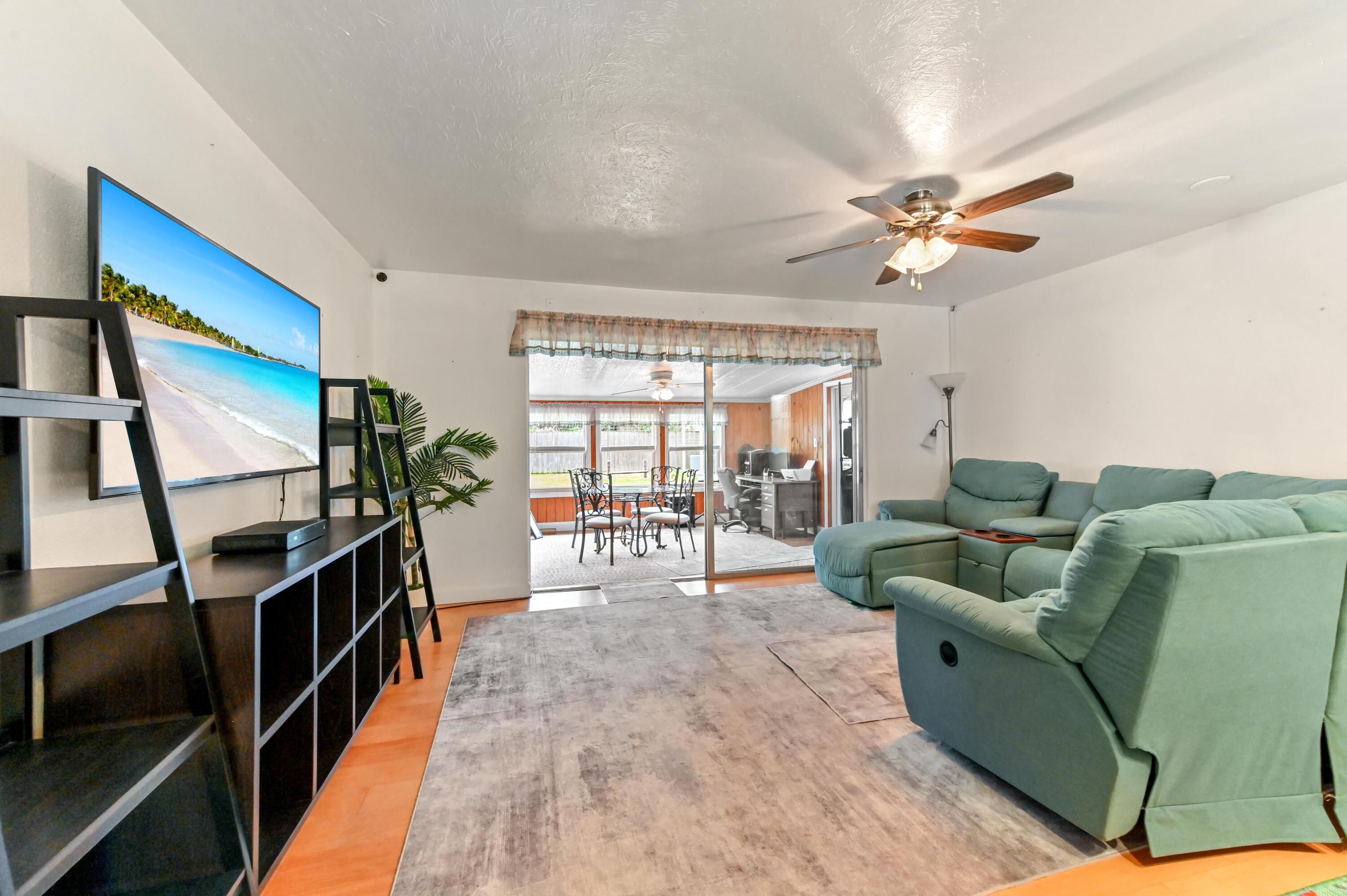 5709 Southeast Indigo Avenue Stuart, FL 34997 - Photo 6 of 24 07 Living room 01