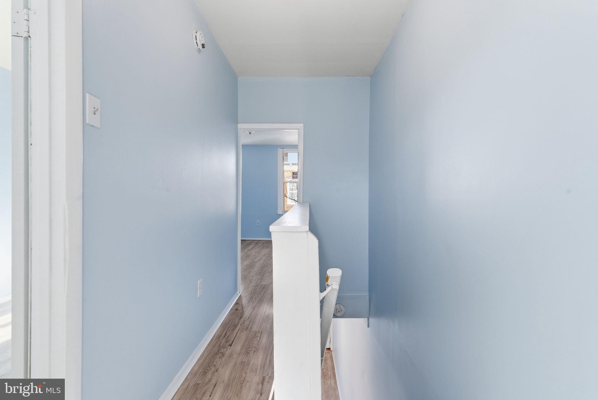 2236 West Firth Street Philadelphia, PA 19132 - Photo 8 of 13 Freshly painted hallway leading to bedrooms.