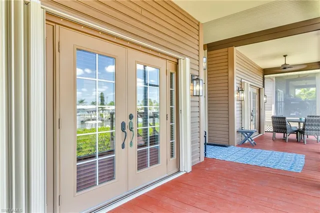 a view of a livingroom with wooden floor and furniture