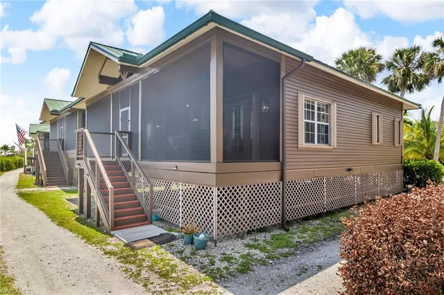 a front view of a house with garage