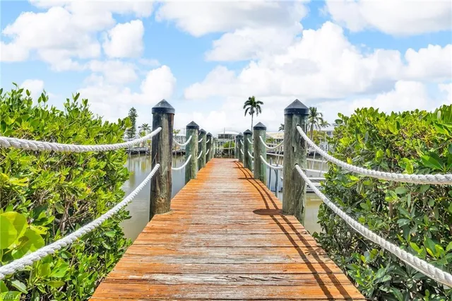 a view of a balcony with wooden floor