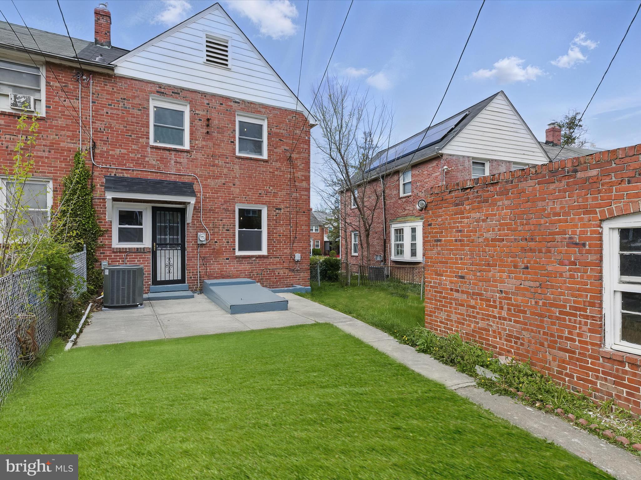 1317 Pentwood Road Baltimore, MD 21239 - Photo 16 of 39 Patio and Rear Lawn off Kitchen
