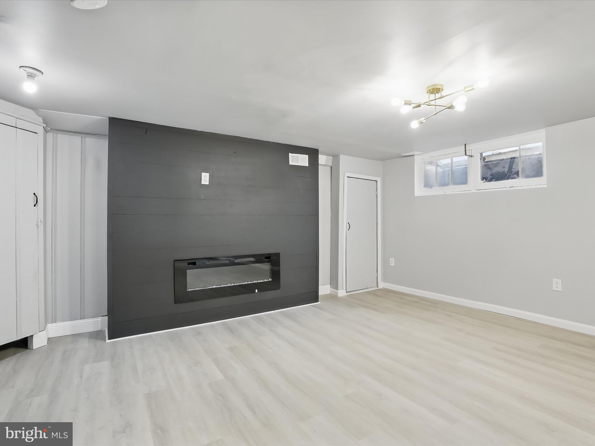 1317 Pentwood Road Baltimore, MD 21239 - Photo 29 of 39 Recreation Room Electric Fireplace