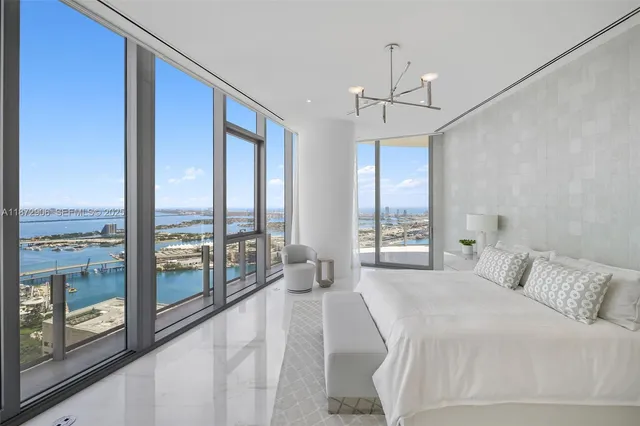 a bathroom with a tub and shower