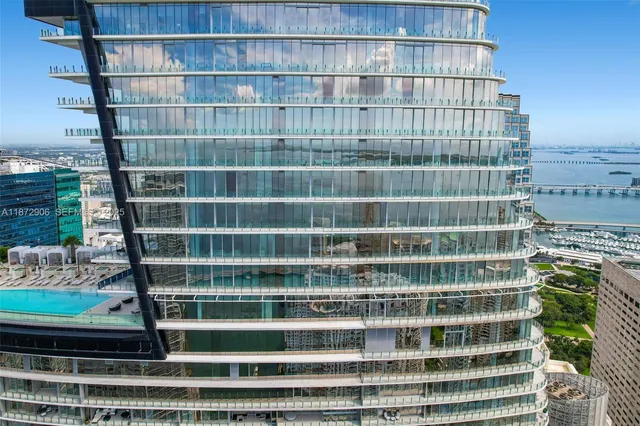 a view of a bathroom with a sink and a mirror