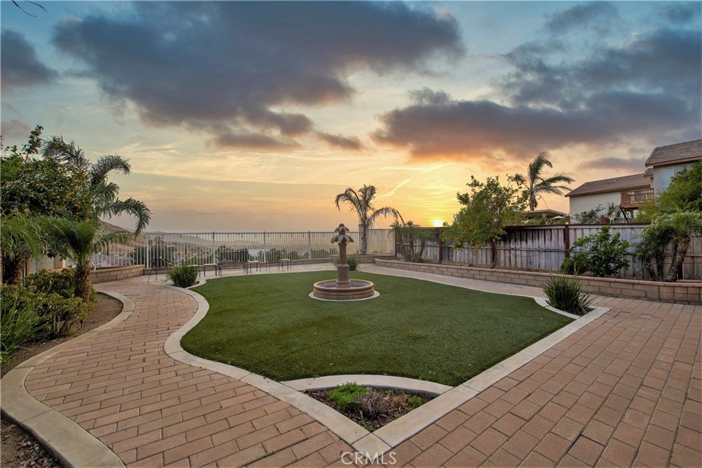16163 Setting Sun Circle Riverside, CA 92503 - Photo 2 of 36 a view of a garden with sitting area