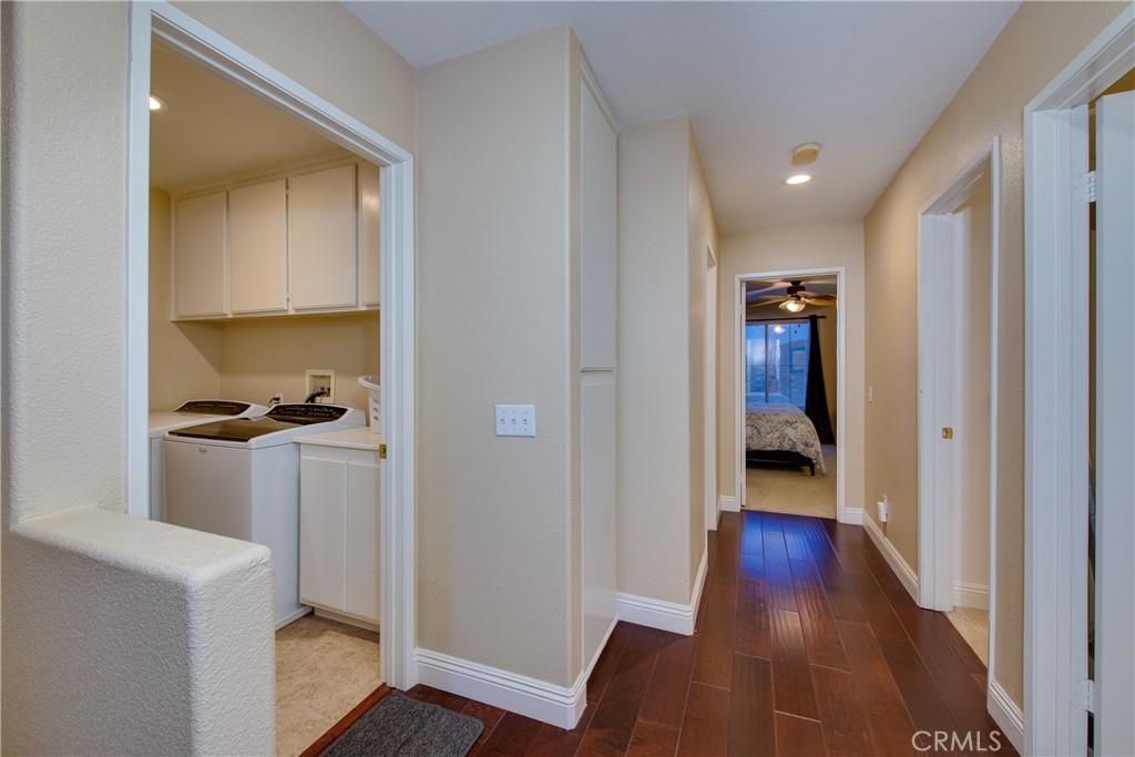 16163 Setting Sun Circle Riverside, CA 92503 - Photo 27 of 36 a view of hallway with wooden floor