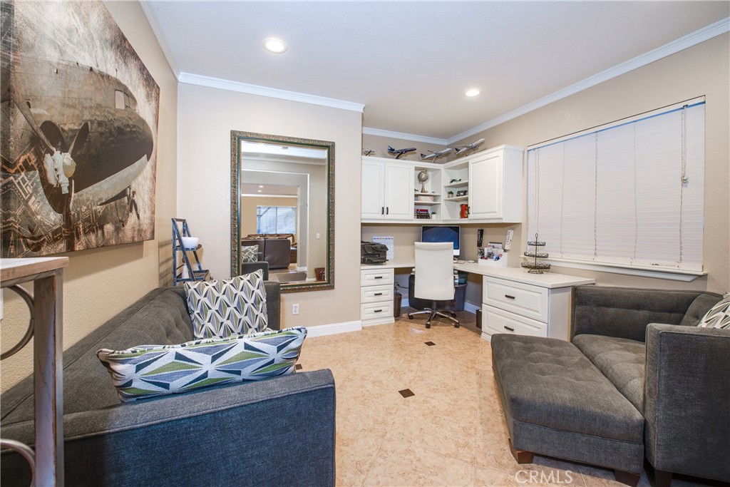 16163 Setting Sun Circle Riverside, CA 92503 - Photo 30 of 36 a living room with furniture and a fireplace