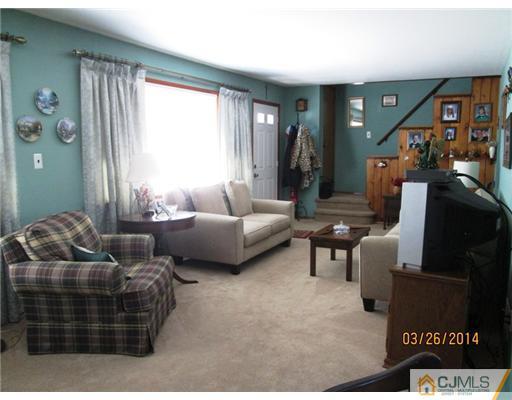 19 Montview Road Edison, NJ 08837 - Photo 13 of 15 a living room with furniture and a window