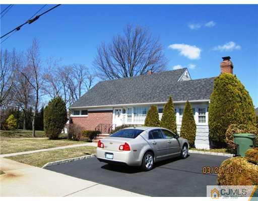 19 Montview Road Edison, NJ 08837 - Photo 15 of 15 a car parked in front of a house