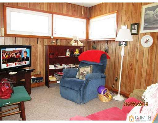 19 Montview Road Edison, NJ 08837 - Photo 6 of 15 a living room with furniture and a window