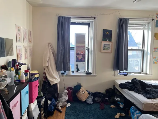 a room with gym equipment and a large window
