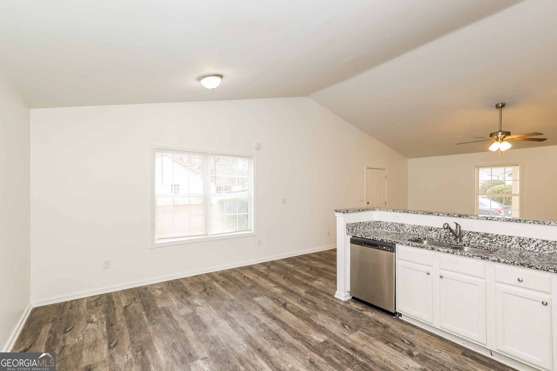 138 Pope Lane Newnan, GA 30263 - Photo 11 of 25 a view of a kitchen sink and natural light
