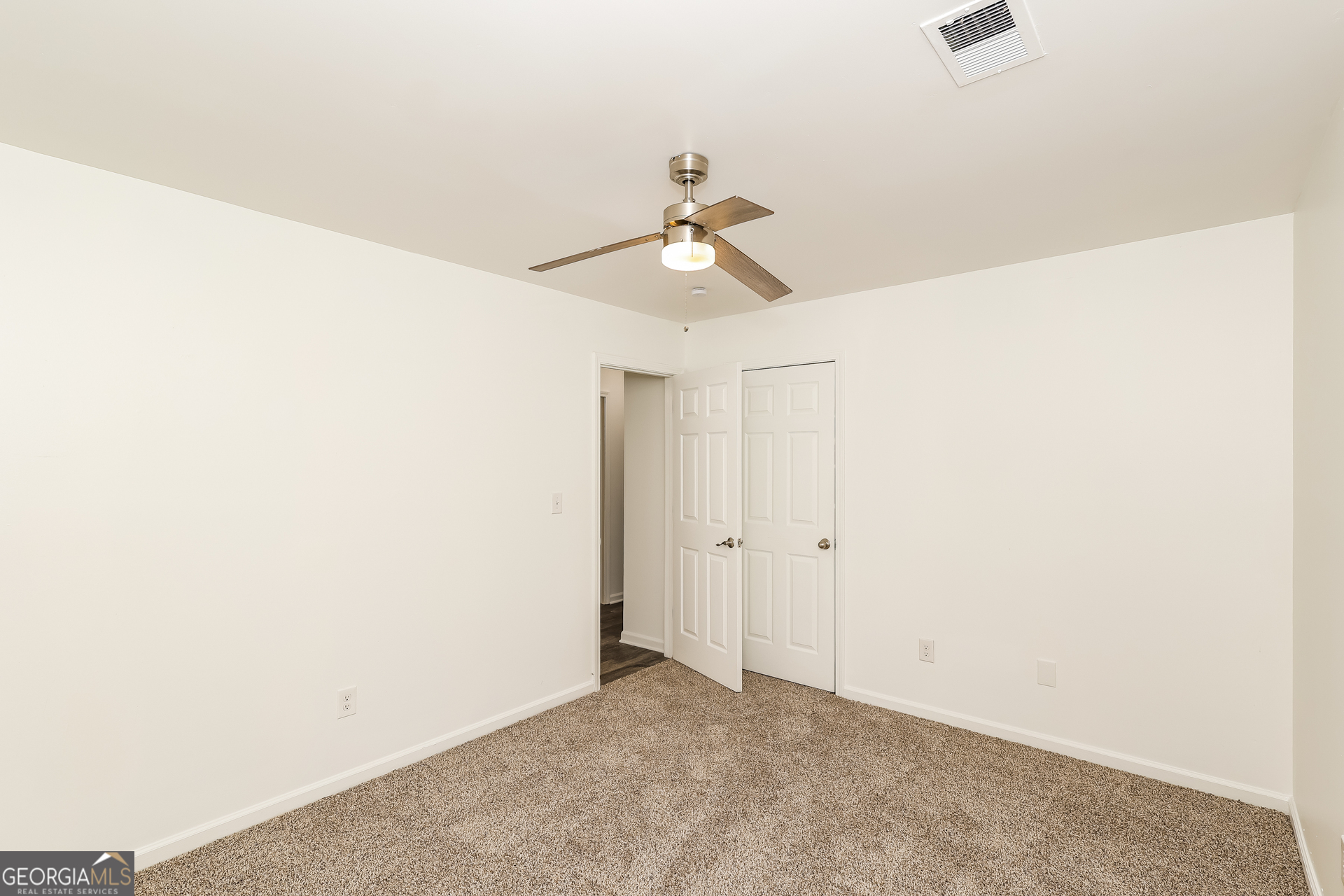 138 Pope Lane Newnan, GA 30263 - Photo 20 of 25 a view of a chandelier fan in a room