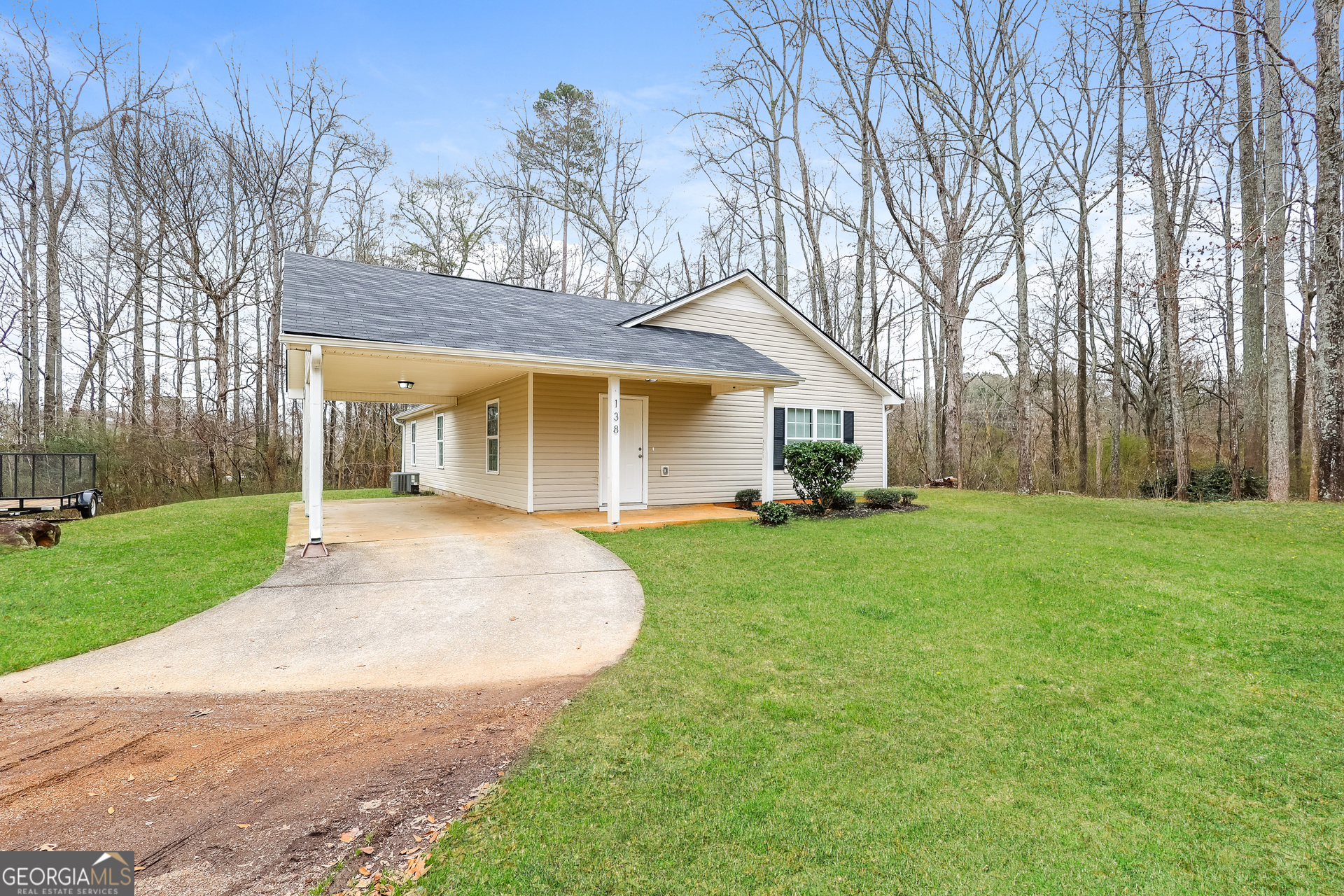 138 Pope Lane Newnan, GA 30263 - Photo 2 of 25 front view of a house with a yard