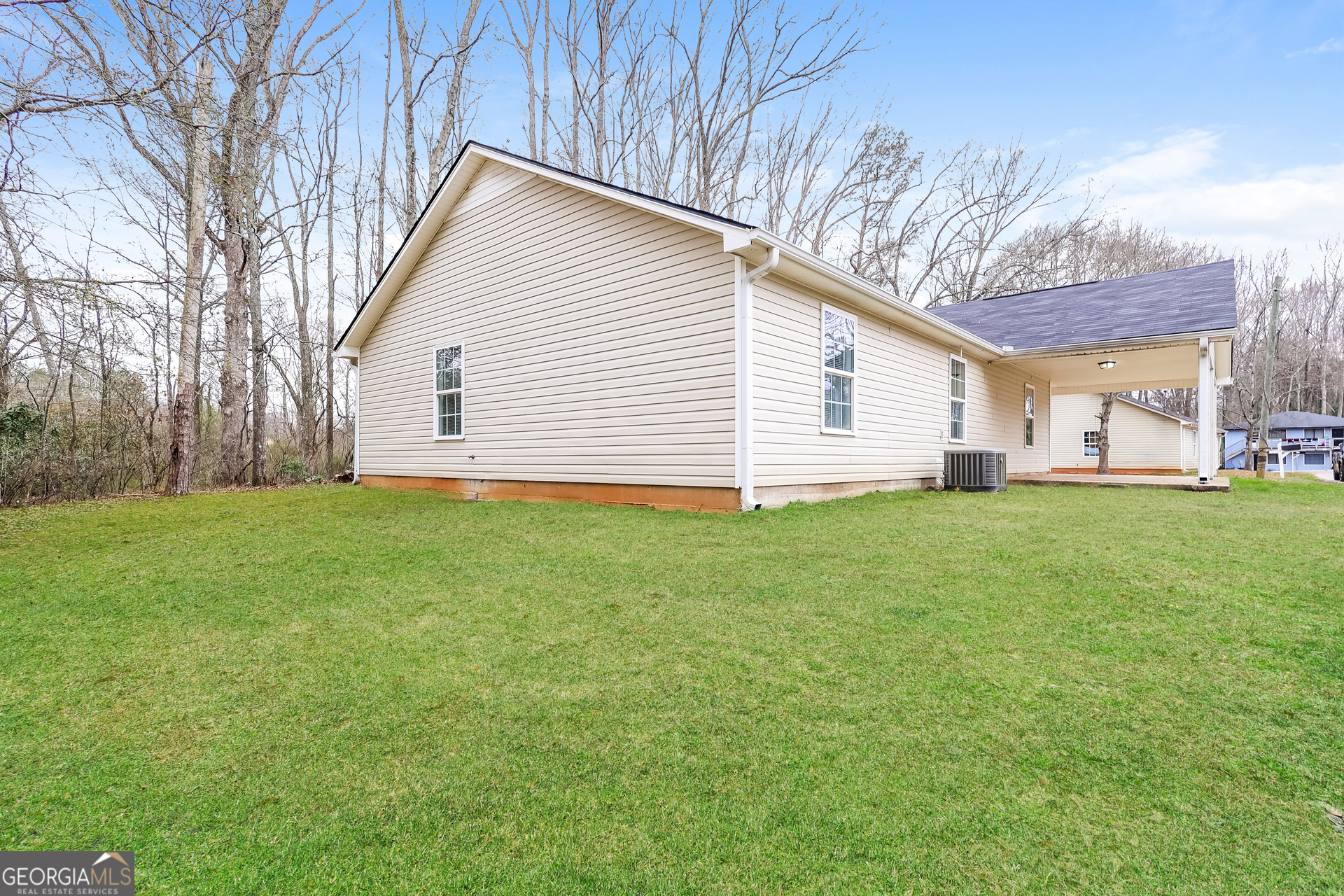 138 Pope Lane Newnan, GA 30263 - Photo 24 of 25 a view of a house with a yard