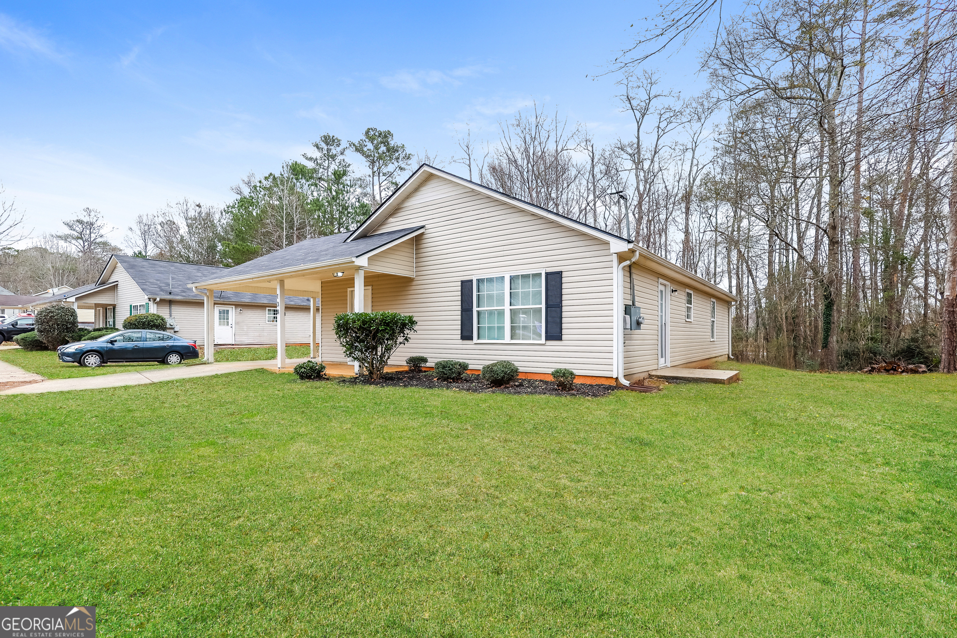 138 Pope Lane Newnan, GA 30263 - Photo 3 of 25 a view of a house with backyard