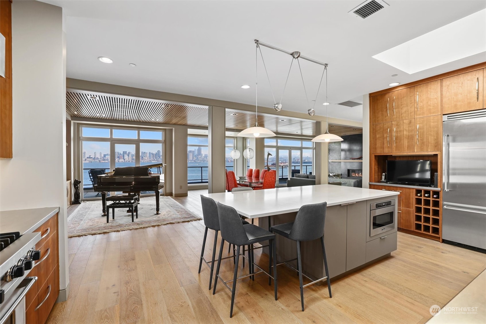 1661 Harbor Avenue Southwest, Unit 600 Seattle, WA 98126 - Photo 14 of 40 a large kitchen with a table and chairs