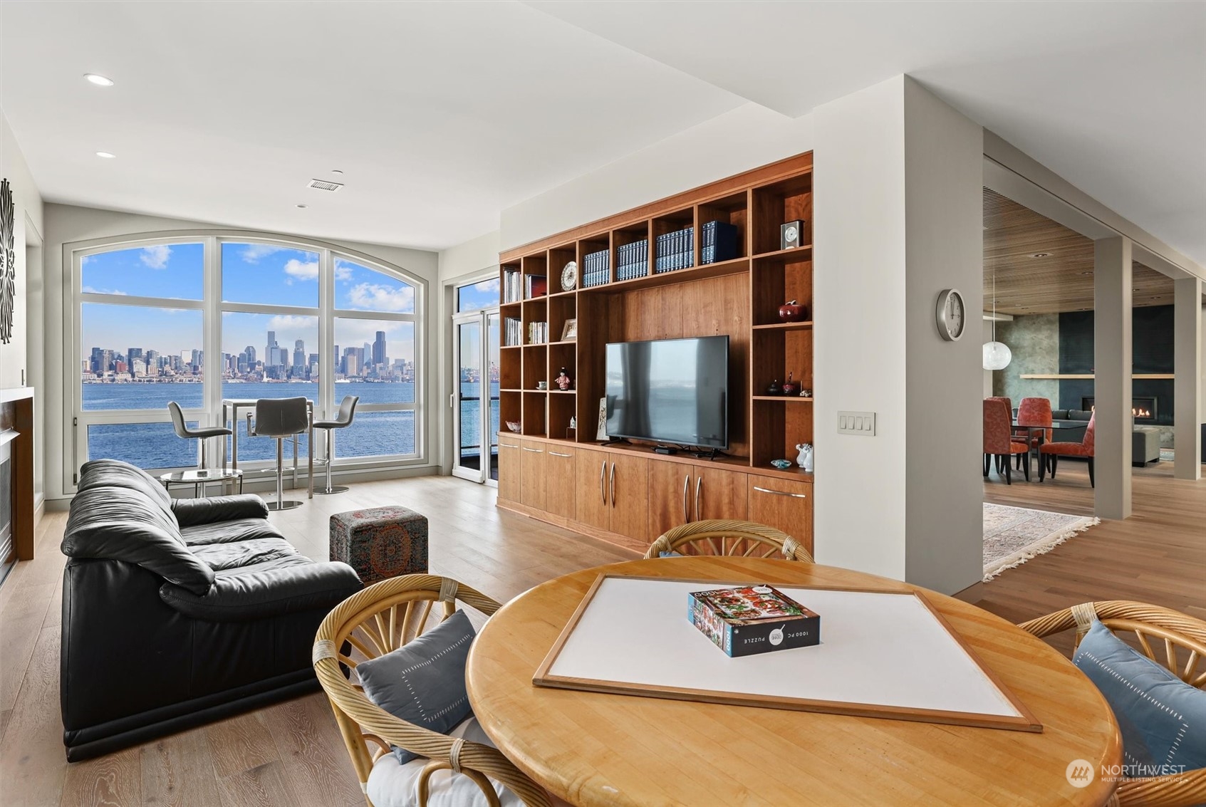 1661 Harbor Avenue Southwest, Unit 600 Seattle, WA 98126 - Photo 18 of 40 a living room with furniture and a flat screen tv