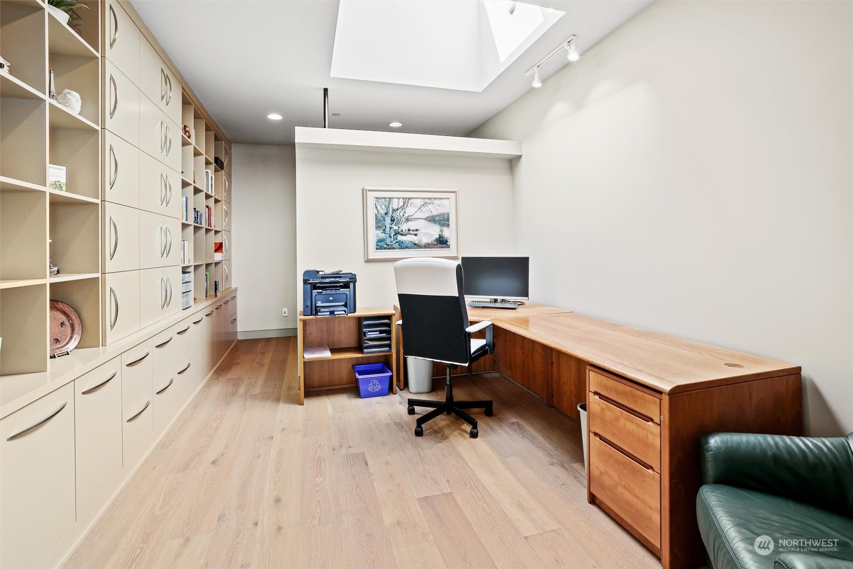 1661 Harbor Avenue Southwest, Unit 600 Seattle, WA 98126 - Photo 23 of 40 a view of a workspace with furniture and a window