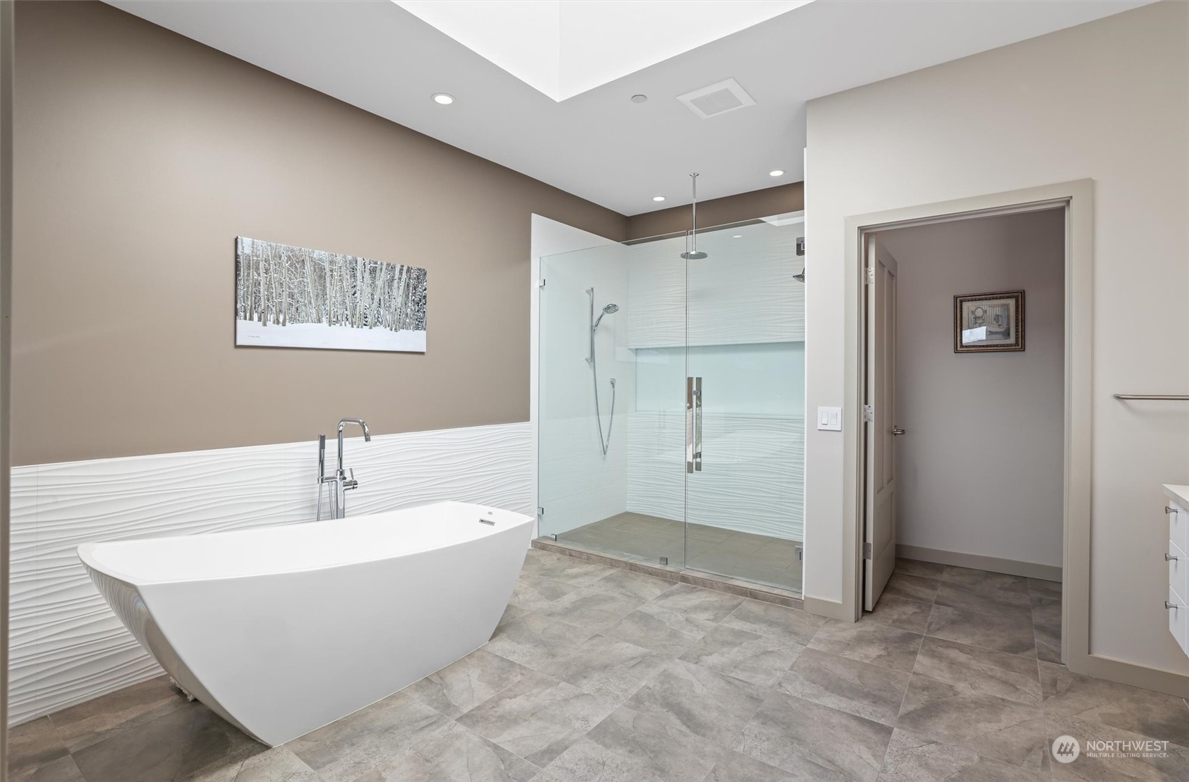 1661 Harbor Avenue Southwest, Unit 600 Seattle, WA 98126 - Photo 27 of 40 a spacious bathroom with a bathtub and shower