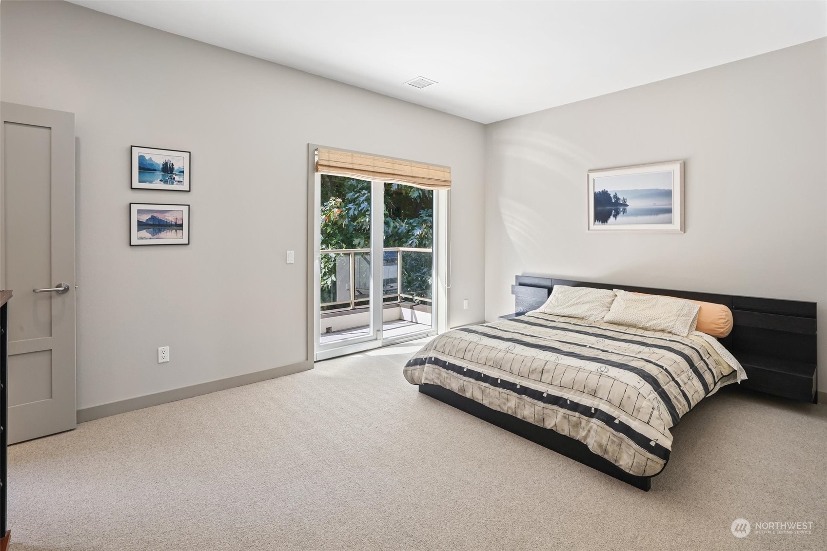 1661 Harbor Avenue Southwest, Unit 600 Seattle, WA 98126 - Photo 31 of 40 a spacious bedroom with a bed and a window
