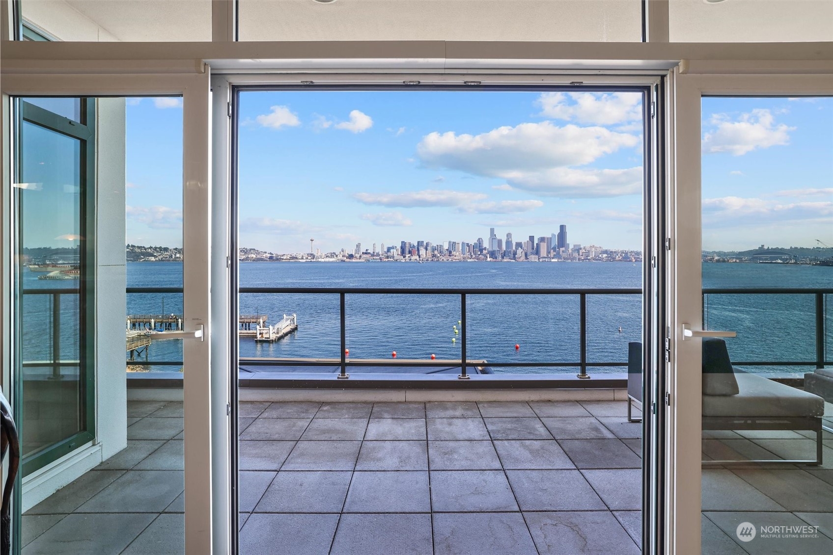 1661 Harbor Avenue Southwest, Unit 600 Seattle, WA 98126 - Photo 5 of 40 a view of a glass door with a view from balcony