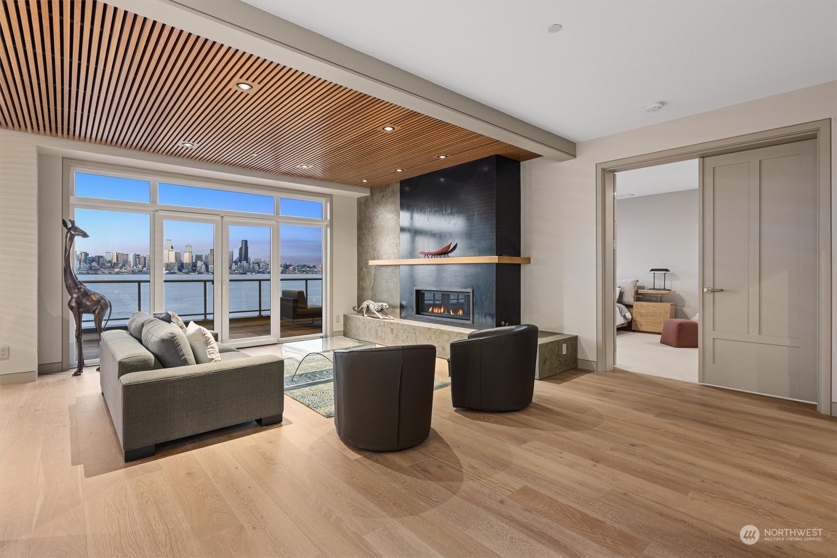 1661 Harbor Avenue Southwest, Unit 600 Seattle, WA 98126 - Photo 9 of 40 a living room with furniture and a flat screen tv