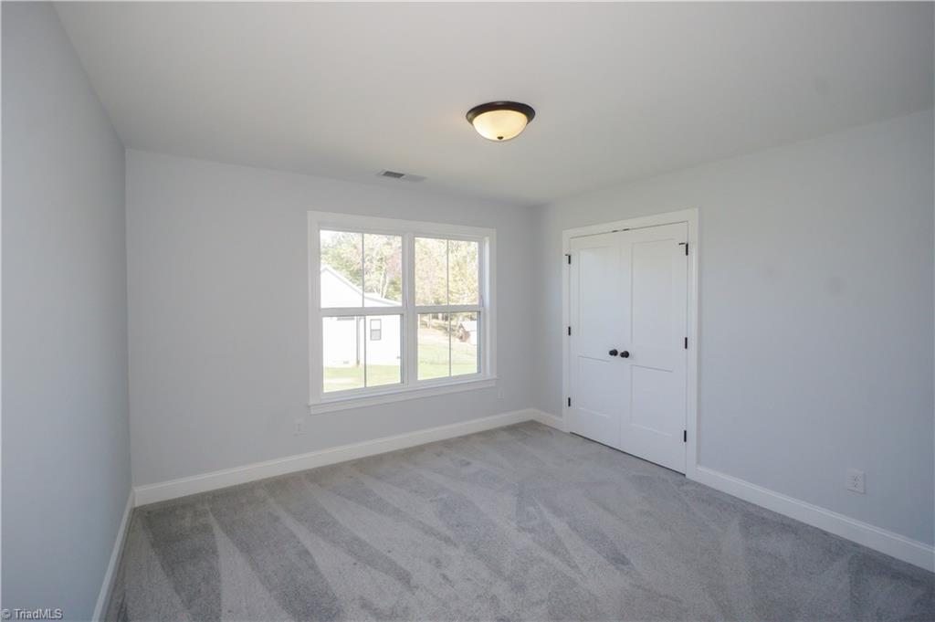 725 Sardis Church Road Madison, NC 27025 - Photo 13 of 21 2nd bedroom - 2nd floor