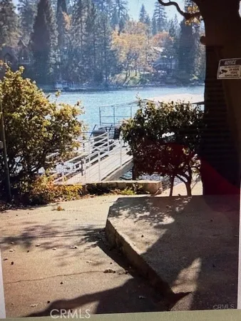 a view of a backyard of the house