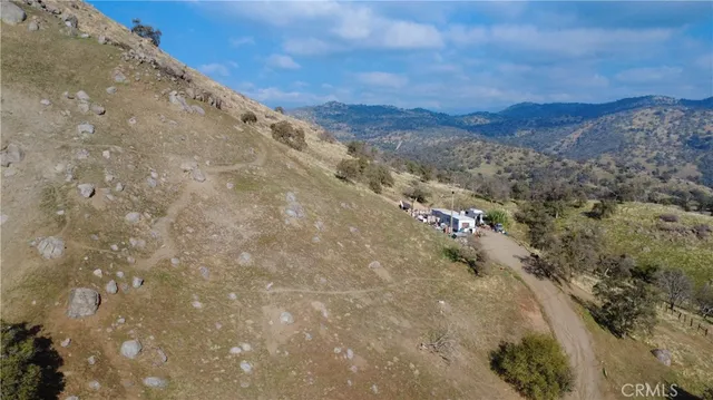 a view of mountain view with lots of trees