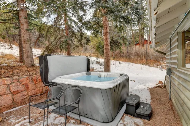 a view of backyard with sink and outdoor seating